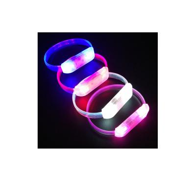 China 6-8 Hours New Design Control Led Wristband Custom Flashing Activated Glowing Led Flash Party Light Wristband for sale