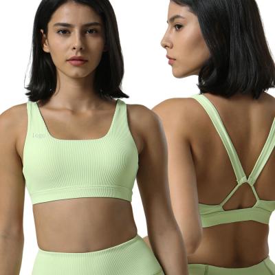 China New Breathable Fashionable Cross Yoga Bra Women's Fitness Sports Back Bra for sale