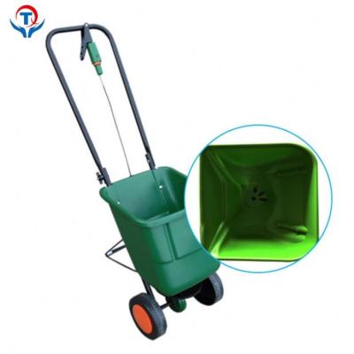 China HandyOperated Manual Corn Planter Lawn Seed Spreader Tractor Fertilizer Spreader for sale