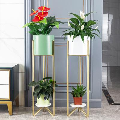 China Modern Bright Colorful Blue Green Orange Yellow Shelf With Flower Pot Iron Racks In Floor Plant Shelves for sale