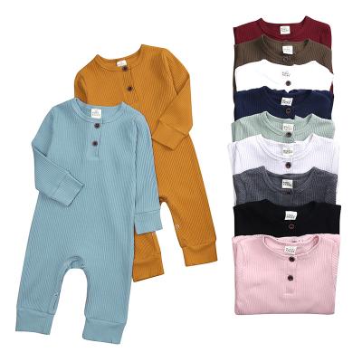 China Cotton Springs Unisex Long Sleeve Rompers Clothes Pajamas Plain Snap Button Baby Clothes Newborn Boys Girls for sale