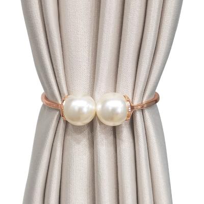 China Modern Pearl curtain tieback spring design curtain clip magnetic tied thin window curtains tie back wedding decorations Te koop