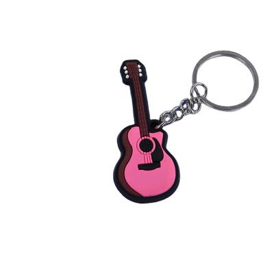 China Wholesale Rubber Keychain Rubber Keychains China Wholesale Rubber Rubber Guitar Key Chain Round for sale