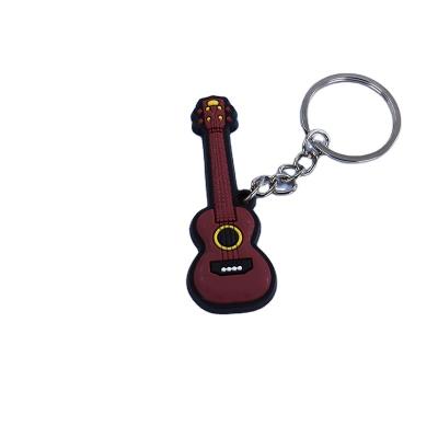 China Wholesale High Quality Rubber Keychains Rubber Anime Guitar Key Chain Key Chain for sale