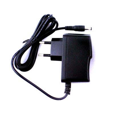 China Plastick Interchangeable US Plugs UK Au 5v 1a Power Adapter Mobile Charger Adapter for sale