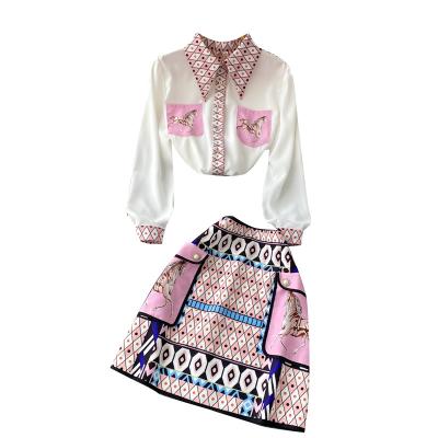 China 2022 Waterproof Women's Set High New Long Sleeve Turn-down Collar Korean Chic Loose Pocket Shirt High Printed Skirt Two-Piece Set for sale