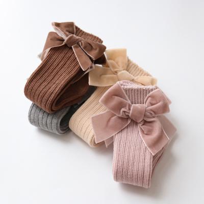 China QUICK DRY baby knee high fall and winter socks with velvet bow for sale