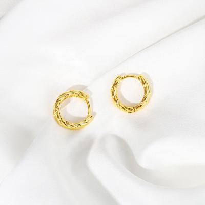 China CLASSIC 18K Gold Plated Curve Twisted Lines Hypoallergenic Hollow Out Stainless Steel Huggie Earrings For Women 2021 for sale