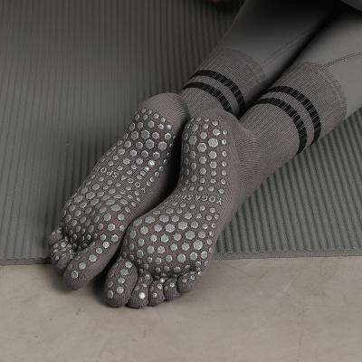 China Wholesale Non-slip Professional Antibacterial 5 Toe Yoga Socks Pilates Five-Toed Grip Custom High Tube Socks Medium Silicone Socks for sale