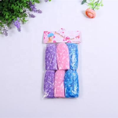 China 2022 Dot Printing Wholesale Water Resistant PE Environmental Protection Promotion Lower Prices Disposable Shower Cap for sale