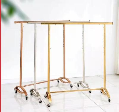 China Removable And Adjustable Simple Promotional Shelves Curve Base Simple Hanging Clothes Rack for sale