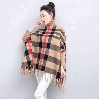 China Anti-Wrinkle Fashion Clothes Sweater Women Turtle Neck Loose Tarting Checked Knit Plaid Shawl Tassel Poncho for sale