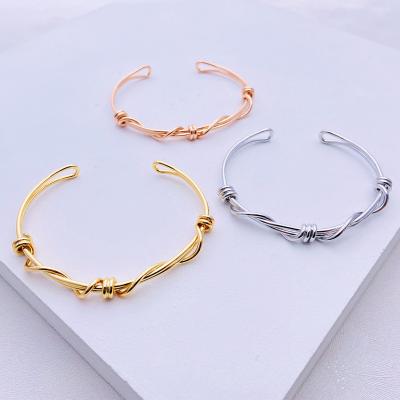 China BOHEMIA High Quality 18K Gold Plated PVD Knot Rope Shape Bangle Brass Twisted Open Bangle Bracelet for sale