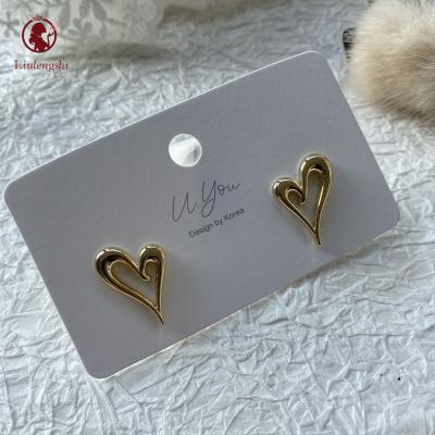 China Women Gold Tone Hollow Heart Shape Stud Earrings CLASSIC Gold Plated Sweet Tiny Brass Love Heart Stud Earrings for sale