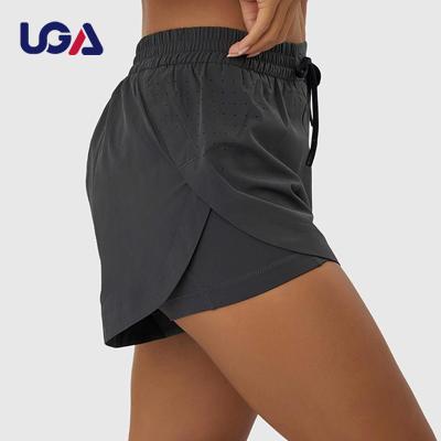 China OEM Breathable Custom Size Drawstring Running Shorts Women Sporty Fitness Sports Yoga Shorts With 2 In 1 Liner for sale