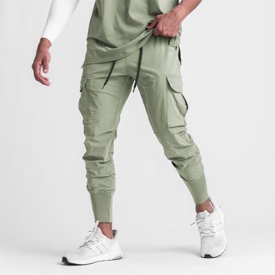 China Hot Selling Summer Men's Casual Anti-Wrinkle Thin Ice Silk Quick Dry Cargo Pants Plus Size Mens Jogger Pants for sale