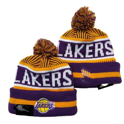 China JOINT Embroidery Basketball Team Logo Na Pom Pom Beanie Hat Wholesale Custom Autumn And Winter New for sale