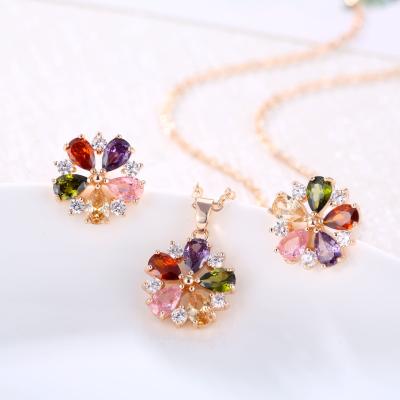 China Fashion Trending Jewelry Flower 18k Gold Plated Necklace Earrings Pendant Necklace Set For Women for sale