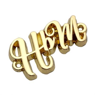 China Wholesale Design Washable Embossed Small 3D Metal Sewing Letters Label For Crafts for sale