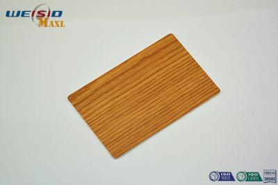 China Los paneles de pared decorativos interiores arquitectónicos del metal con la película de mirada de madera en venta