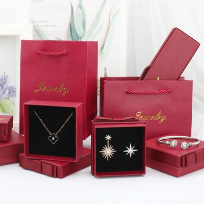 China Hot Selling Low Price Vintage Quality Christmas Jewelry Red Paper Packaging Box Luxury Surprise Box For Jewelry Gift Set for sale