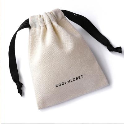 China Hot Sale Medium Beige Logo Cotton Canvas Drawstring Pouch Custom Gift Jewelry Packaging Bags for sale