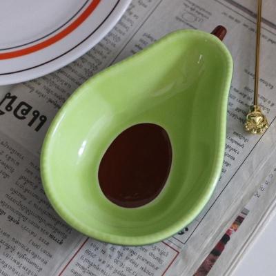 China Viable Unique New Design Shape Green Avocado Ceramic Bowl Hotel Restaurant Home Dish Salad Dipping Bowl for sale