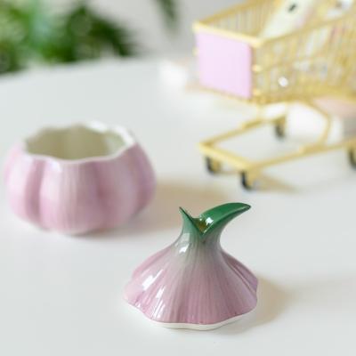 China Sustainable Kitchen Seasoning Box Creative Design Onion Shape Dipping Can Spice Storage Tank For Kitchen for sale