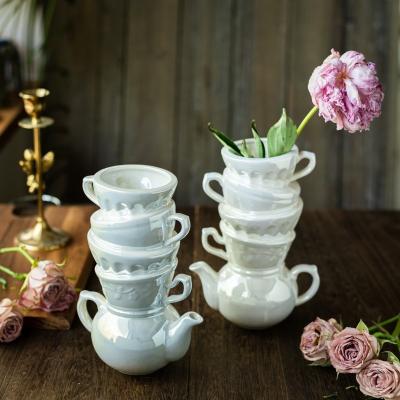 China Retro Design Novelty Novelty Bedroom Decor Unique Nordic Porcelain White Ceramic Flower Vase For Home Decor for sale