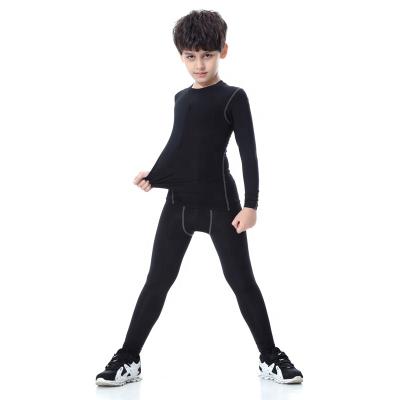 China Boy Sports Antibacterial Running Compression Pants Stretch Football Gaiters for sale