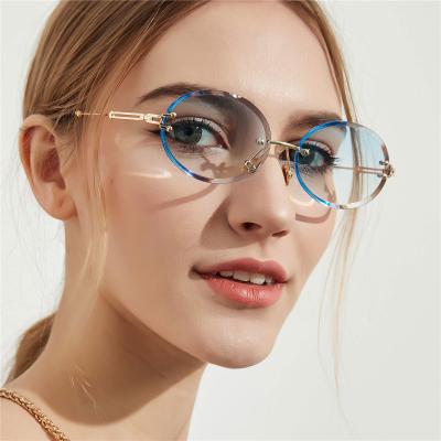 China A18904 Diamond Cut Men Frameless Small Rimless Oval Shape Sunglasses Women Rimless Sun Glasses for sale