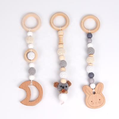 China Soft Toy 3 Pieces/Set Reliable Natural Rabbits Moon Shape Safety Food Grade Beech Wood Baby Stroller Chain Set for sale