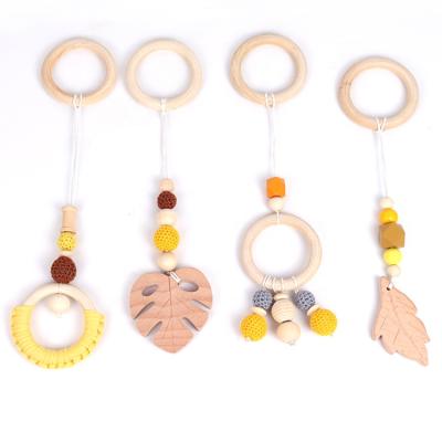 China 4pcs/set Cotton Woven Circle Teether Wooden Toy Set Soft Pendant Toy 4pcs/set Wire Bead Baby Room Decoration Beech Teether New for sale