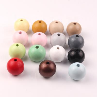 China Wholesale Eco-friendly Environmental Protection Paint Color 30mm Loose Beads Wooden Beads For Jewelry Making for sale