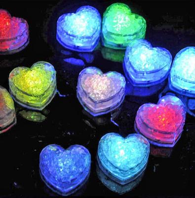 China Nightclub LED Ice Cube Light Heart Shape Glow in the Dark Wedding Bar Champagne Tower Party Club Decoration for sale