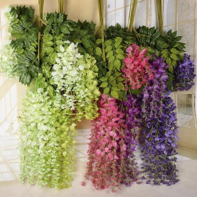 China Likereal Colorful Artificial Wall Flower Decorative Green Vines Wedding Wall Decoration Hanging Flower Vine for sale