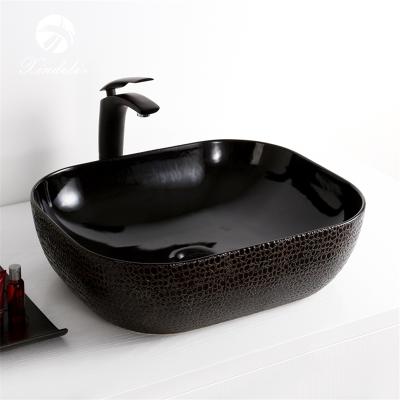 China Modern New Sale Above Counter Mount Ceramic Bathroom Sink Black Decorative Wash Basin for sale