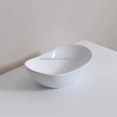 China Modern Design Oval Shape Porcelain Hand Wash Basin Bathroom Countertop Modern European Ceramic Sink Bowl for sale