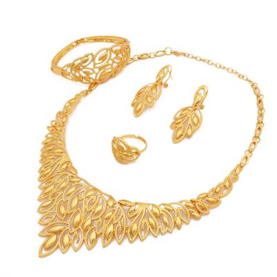 China Simplicity Dubai Bridal Jewelry Set Women's Gold Wedding Ring Four-Piece Necklace Bracelet Earrings Set for sale