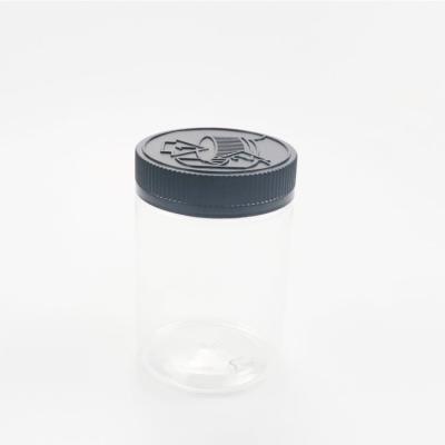 China Wholesale Clear Space Cosmetic Pet Storage Food Packaging 300ml Plastic Cookie Jar With Black Lids for sale