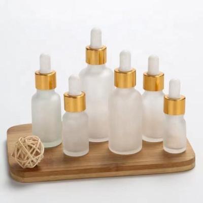 China Personal Care Glass Bottles 30ml Glass Water Bottle Glass Dropper Bottle for sale