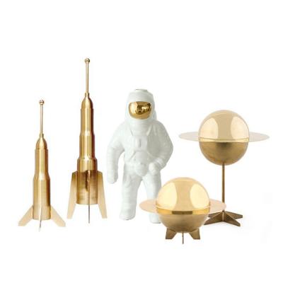 China Nordic Style Planet Ornament Astronaut Space Model Polyresin Resin Gold Craft Kit Kids Craft Supplies for sale