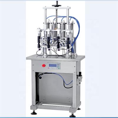 China GARMENT Four Heads Vacuum Perfume Bottle Filling Machine Automatic Filling Machine for sale