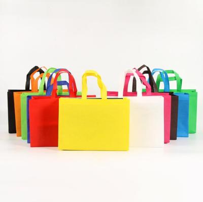 China Reusable Factory Selling Reusable Non Woven Tote Handle Shopping Bag Packing Grocery Bag Custom Logo for sale