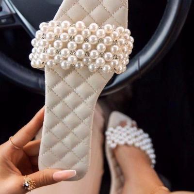 China Hot Selling Fashion Trend Women's Flat Sandals Women's Pearl Slippers Flat Slides With Pearls for sale