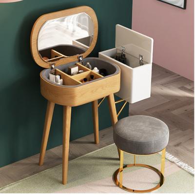 China Foldable Nordic Small Dresser Bedroom Storage Makeup Table Simple Solid Wood Shake Makeup Table Mini for sale