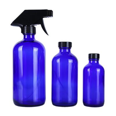 China Original Personal Care Hand Sanitizer Spray Bottle Blue Boston Glass Bottle Press Essential Oil Glass Bottle for sale