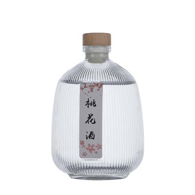 China High Vertical Stripes Sealed Glass Wine Bottles Fruit Wine White Wine Whiskey Liquor Bottle for sale