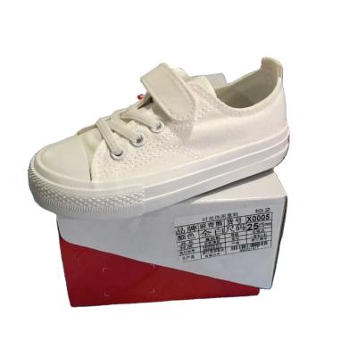 China Flat New design low price flat white kids canvas sneakers classic casual light school kids canvas trendy shoes for sale