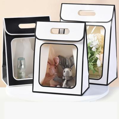 China Custom Materials Fashion Recycled Wedding Guests Luxury Paper Gift Bag With Window for sale